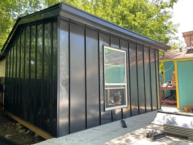 Black standing seam metal wall panels for Roof Inspection in Bayou Blue