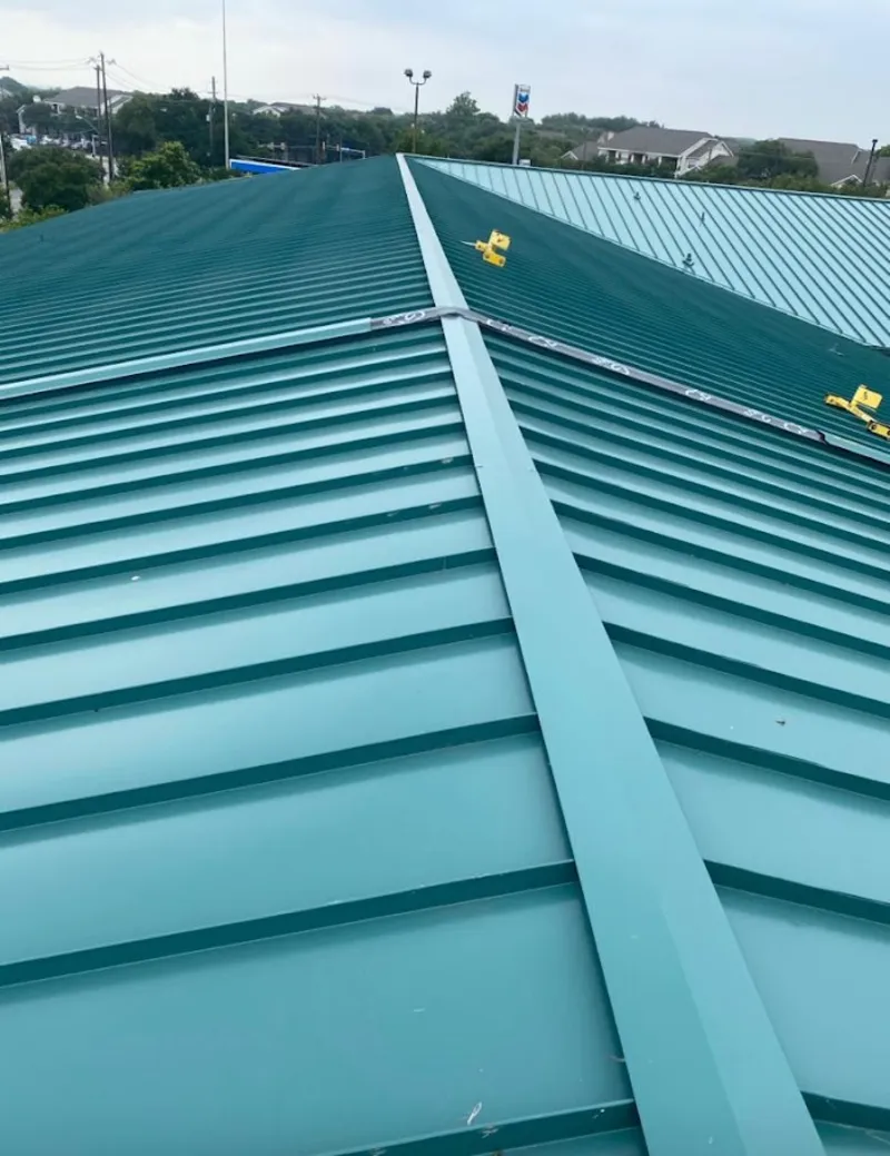 Green commercial metal roof ridge and valley for Metal Roof Repair in Bayou Blue
